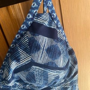 Lucky Brand Size L Navy Blue 2 piece reversible bottom top is not reversible.